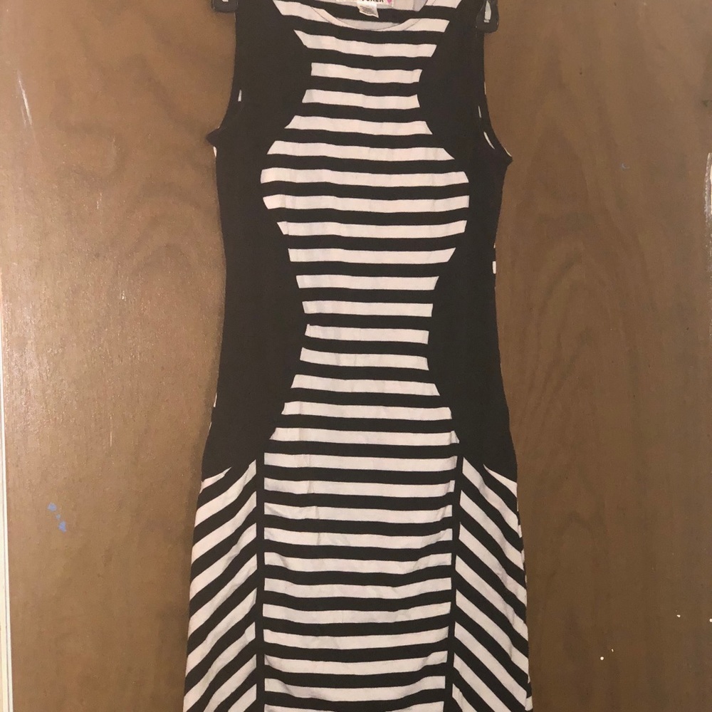 Black and white dress with black silhouette detail